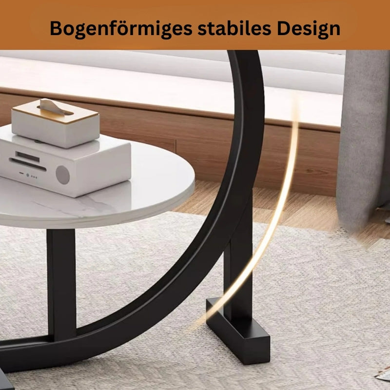 Bogenförmiges Metallgestell eines Beistelltisches mit stabiler Konstruktion und modernem Design.