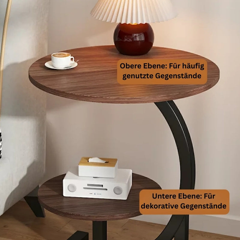 Beistelltisch mit oberer Ablage für häufig genutzte Gegenstände und unterer Ebene für Dekoration.
