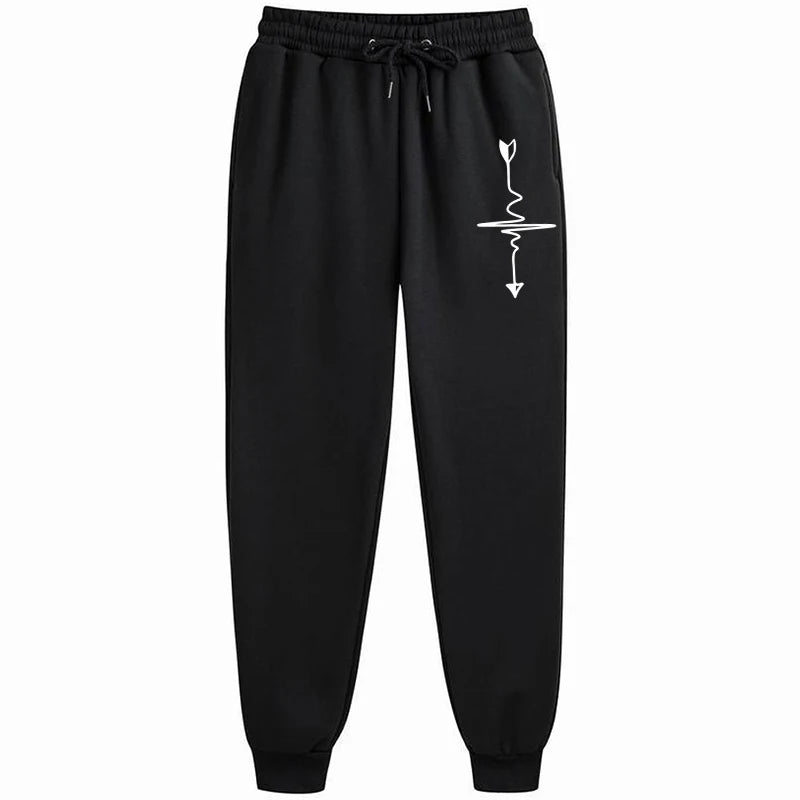 Schwarze Damen Jogginghose mit Herz-Pfeil-Print und elastischem Bund