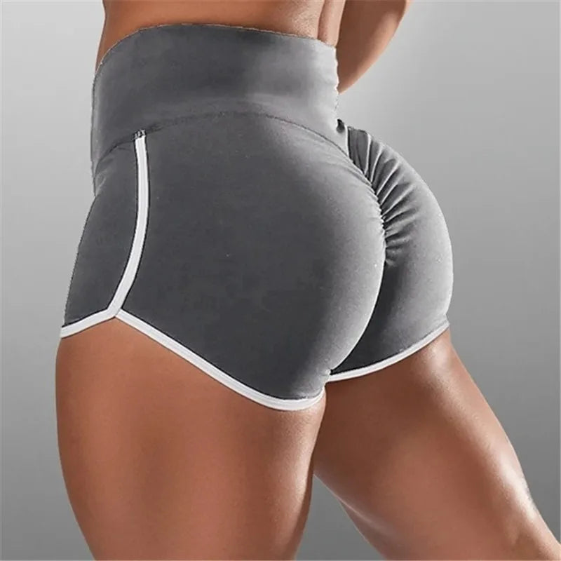 Graue Damen Sport Shorts mit Scrunch Naht im Detail.