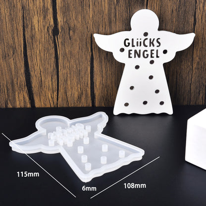 Silikonform in Engelsform mit Schriftzug Glücksengel und Lichtlöchern