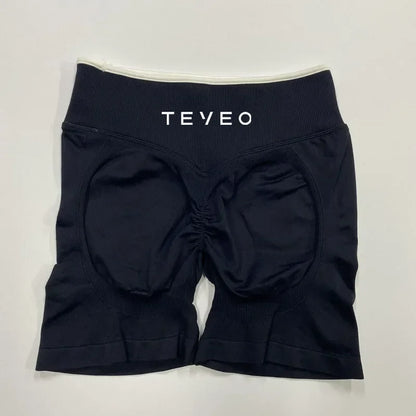 Schwarze nahtlose Damen Sport Shorts mit Scrunch Butt und hohem Bund in Rückansicht.