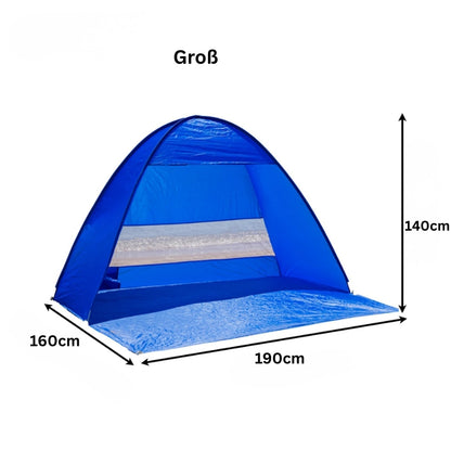 Große Pop-up Strandmuschel mit viel Platz für mehrere Personen und Gepäck.