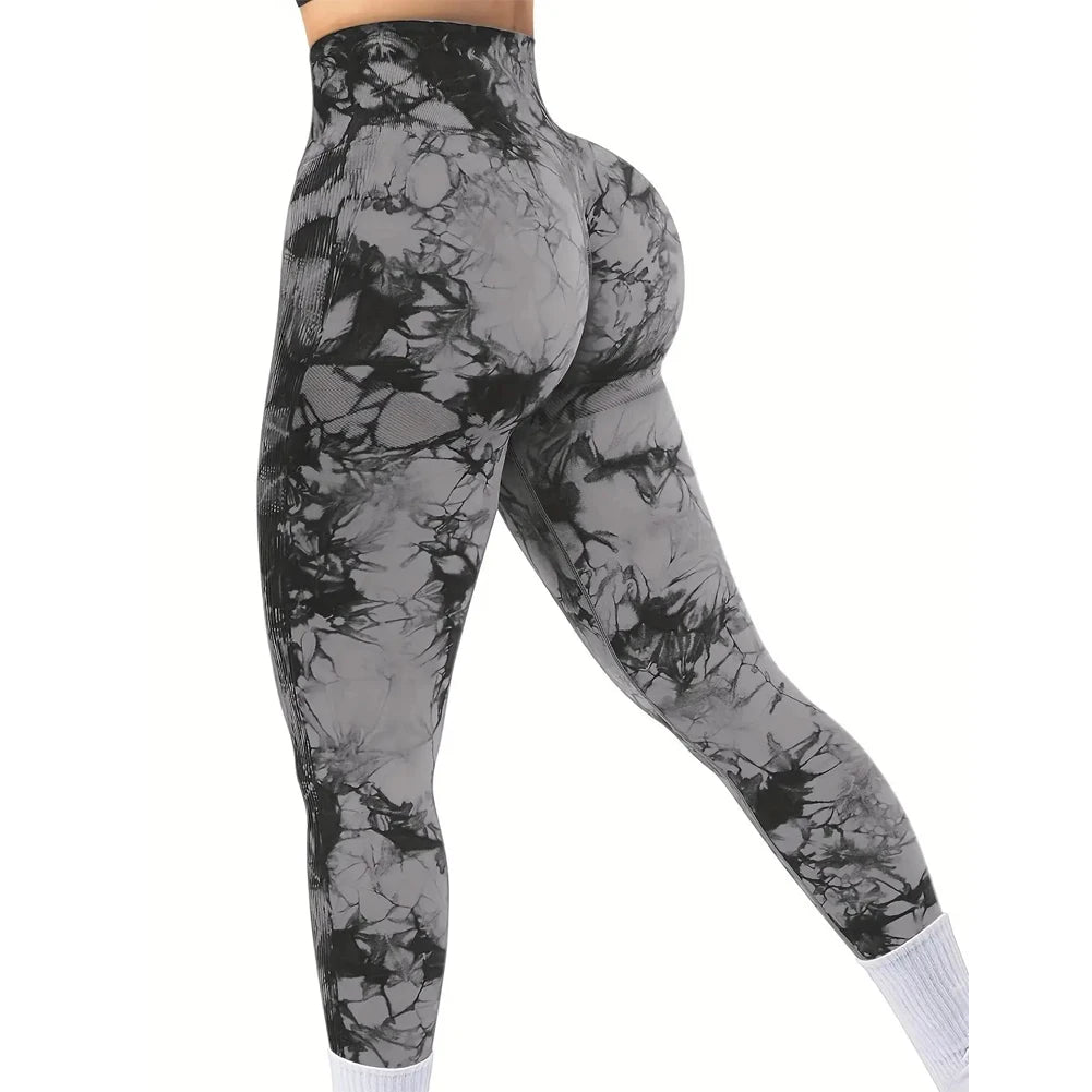 Elastische Fitnessleggings in Grau mit schwarzem Marmormuster und hoher Taille.