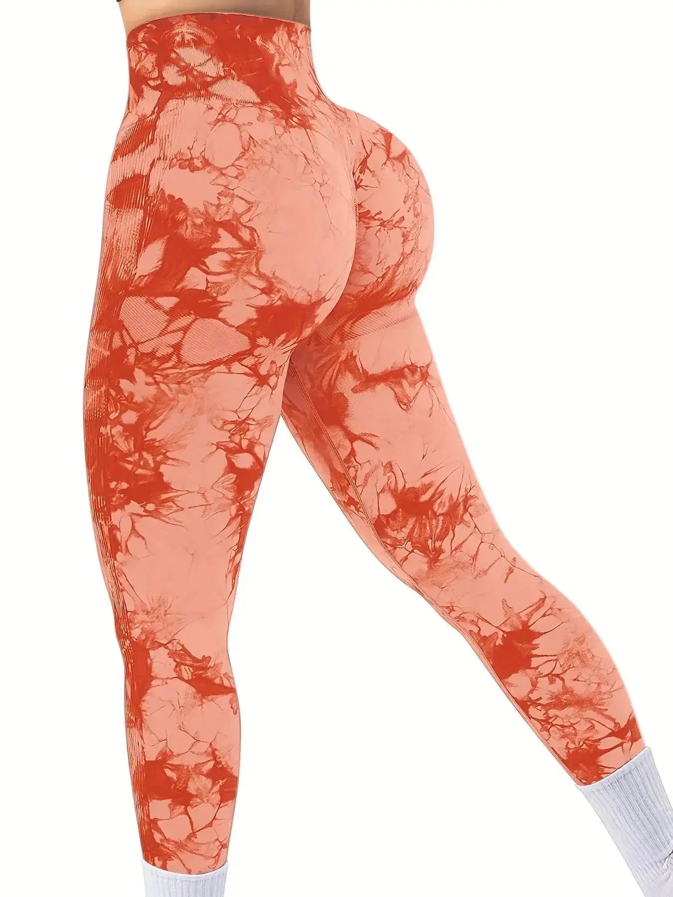 High-Waist Leggings in Orange mit dunklem Marmormuster und sportlicher Silhouette.