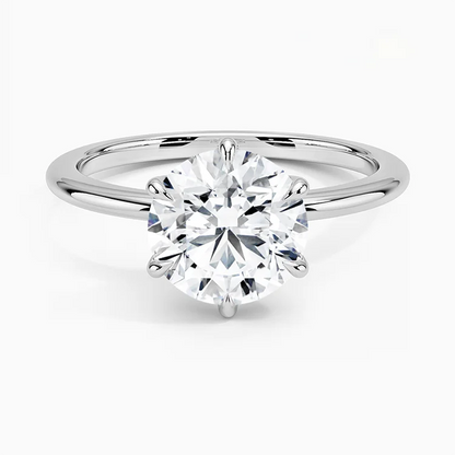 Klassischer Verlobungsring aus Weißgold mit rundem Diamant in Frontansicht