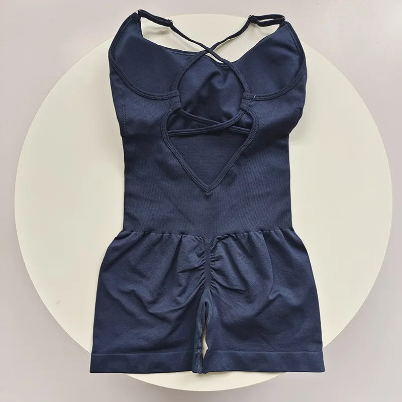 Nahtloser Yoga-Overall in Dunkelblau mit offenem Rücken und elastischem Material.